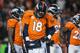 DENVER, CO - DECEMBER 12: Quarterback Peyton Manning #18 of the Denver Broncos hangs his head during a break in the action in the fourth quarter of a game against the San Diego Chargers at Sports Authority Field Field at Mile High on December 12, 2013 in Denver, Colorado. (Photo by Dustin Bradford/Getty Images)