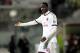 LIVORNO, ITALY - DECEMBER 07: Mario Balotelli of AC Milan in action during the Serie A match between AS Livorno and AC Milan at Stadio Armando Picchi on December 7, 2013 in Livorno, Italy. (Photo by Gabriele Maltinti/Getty Images)