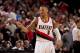 PORTLAND, OR - DECEMBER 2: Damian Lillard #0 of the Portland Trail Blazers celebrates a play against the Indiana Pacers on December 2, 2013 at the Moda Center Arena in Portland, Oregon. NOTE TO USER: User expressly acknowledges and agrees that, by downloading and or using this photograph, user is consenting to the terms and conditions of the Getty Images License Agreement. Mandatory Copyright Notice: Copyright 2013 NBAE (Photo by Cameron Browne/NBAE via Getty Images)