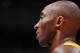 LOS ANGELES, CA - DECEMBER 10: Kobe Bryant #24 of the Los Angeles Lakers looks on during the game against the Phoenix Suns at the Staples Center on December 10, 2013 in Los Angeles, California. NOTE TO USER: User expressly acknowledges and agrees that, by downloading and/or using this Photograph, user is consenting to the terms and conditions of the Getty Images License Agreement. Mandatory Copyright Notice: Copyright 2013 NBAE (Photo by Andrew D. Bernstein/NBAE via Getty Images)