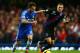 LONDON, ENGLAND - DECEMBER 14: Juan Mata of Chelsea is marked by Stuart O'Keefe of Crystal Palace during the Barclays Premier League match between Chelsea and Crystal Palace at Stamford Bridge on December 14, 2013 in London, England. (Photo by Paul Gilham/Getty Images)