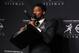 Dec 14, 2013; New York, NY, USA; Florida State Seminoles quarterback and 2013 Heisman Trophy winner Jameis Winston kisses the trophy during a press conference at the New York Marriott Marquis Times Square in New York. Mandatory Credit: Brad Penner-USA TODAY Sports