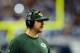 Nov 28, 2013; Detroit, MI, USA; Green Bay Packers quarterback Aaron Rodgers (12) on the sidelines during the first quarter of a NFL football game against the Detroit Lions on Thanksgiving at Ford Field. Mandatory Credit: Andrew Weber-USA TODAY Sports