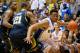 DURHAM, NC - DECEMBER 03: Jabari Parker #1 of the Duke Blue Devils drives the baseline against Zak Irvin #21 of the Michigan Wolverines during play at Cameron Indoor Stadium on December 3, 2013 in Durham, North Carolina. Duke won 79-69. (Photo by Grant Halverson/Getty Images)