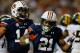 ATLANTA, GA - DECEMBER 07: Tre Mason #21 of the Auburn Tigers celebrates his second quarter touchdown with teammate quarterback Nick Marshall #14 against the Missouri Tigers during the SEC Championship Game at Georgia Dome on December 7, 2013 in Atlanta, Georgia. (Photo by Kevin C. Cox/Getty Images)