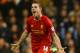 LONDON, ENGLAND - DECEMBER 15: Jordan Henderson of Liverpool celebrates scoring their second goal during the Barclays Premier League match between Tottenham Hotspur and Liverpool at White Hart Lane on December 15, 2013 in London, England. (Photo by Paul Gilham/Getty Images)