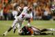 AUBURN, AL - NOVEMBER 30: T.J. Yeldon #4 of the Alabama Crimson Tide tries to avoid the tackle of Chris Davis #11 of the Auburn Tigers in the third quarter at Jordan-Hare Stadium on November 30, 2013 in Auburn, Alabama. (Photo by Kevin C. Cox/Getty Images)