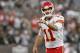 Dec 15, 2013; Oakland, CA, USA; Kansas City Chiefs quarterback Alex Smith (11) reacts after the Chiefs rushed for a touchdown against the Oakland Raiders in the fourth quarter at O.co Coliseum. The Chiefs defeated the Raiders 56-31. Mandatory Credit: Cary Edmondson-USA TODAY Sports