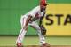 MIAMI, FL - SEPTEMBER 24: Shortstop Jimmy Rollins #11 of the Philadelphia Phillies plays against the Miami Marlins at Marlins Park on September 24, 2013 in Miami, Florida. The Phillies defeated the Marlins 2-1 to give Miami 100 losses for the season. (Photo by Marc Serota/Getty Images)