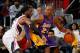 ATLANTA, GA - DECEMBER 16: DeMarre Carroll #5 of the Atlanta Hawks defends against Kobe Bryant #24 of the Los Angeles Lakers at Philips Arena on December 16, 2013 in Atlanta, Georgia. NOTE TO USER: User expressly acknowledges and agrees that, by downloading and or using this photograph, User is consenting to the terms and conditions of the Getty Images License Agreement. (Photo by Kevin C. Cox/Getty Images)
