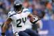 EAST RUTHERFORD, NJ - DECEMBER 15: Marshawn Lynch #24 of the Seattle Seahawks carries the ball in the third quarter against the New York Giants at MetLife Stadium on December 15, 2013 in East Rutherford, New Jersey.The Seattle Seahawks defeated the New York Giants 23-0. (Photo by Elsa/Getty Images)