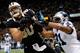 NEW ORLEANS, LA - DECEMBER 08: Jimmy Graham #80 of the New Orleans Saints has a pass broken up by Mike Mitchell #21 of the Carolina Panthers at Mercedes-Benz Superdome on December 8, 2013 in New Orleans, Louisiana. (Photo by Chris Graythen/Getty Images)