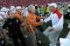 LINCOLN, NE - OCTOBER 16: Coach Mack Brown (left) of the Texas Longhorns shakes hands with Coach Bo Pelini of the Nebraska Cornhuskers after their game at Memorial Stadium on October 16, 2010 in Lincoln, Nebraska. Texas Defeated Nebraska 20-13. (Photo by Eric Francis/Getty Images)