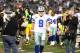 Dec 15, 2013; Arlington, TX, USA; Dallas Cowboys quarterback Tony Romo (9) walks off the field as photographers capture images after the game against the Green Bay Packers at AT&T Stadium. The Packers beat the Cowboys 37-36. Mandatory Credit: Matthew Emmons-USA TODAY Sports