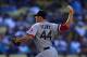 LOS ANGELES, CA - AUGUST 25: Jake Peavy #44 of the Boston Red Sox pitches in the first inning against the Los Angeles Dodgers during the MLB game at Dodger Stadium on August 25, 2013 in Los Angeles, California. (Photo by Victor Decolongon/Getty Images)