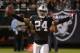 October 6, 2013; Oakland, CA, USA; Oakland Raiders free safety Charles Woodson (24) celebrates after intercepting the ball against the San Diego Chargers during the fourth quarter at O.co Coliseum. The Raiders defeated the Chargers 27-17. Mandatory Credit: Kyle Terada-USA TODAY Sports