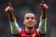MANCHESTER, ENGLAND - DECEMBER 14: Theo Walcott of Arsenal celebrates after scoring his first goal during the Barclays Premier League match between Manchester City and Arsenal at Etihad Stadium on December 14, 2013 in Manchester, England. (Photo by Clive Brunskill/Getty Images)
