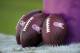 Oct 20, 2013; Charlotte, NC, USA; A view of footballs with pink breast cancer awareness logos before the game between the Carolina Panthers and the St. Louis Rams at Bank of America Stadium. Mandatory Credit: Sam Sharpe-USA TODAY Sports