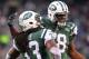 Dec 8, 2013; East Rutherford, NJ, USA; New York Jets running back Chris Ivory (33) celebrates his touchdown run with defensive tackle Leger Douzable (78) during the second half at MetLife Stadium. The Jets defeated the Raiders 37-27. Mandatory Credit: Ed Mulholland-USA TODAY Sports
