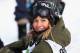 BRECKENRIDGE, CO - DECEMBER 13: Jamie Anderson looks on as she wins the women's snowboard slopestyle at the Dew Tour iON Mountain Championships on December 13, 2013 in Breckenridge, Colorado. (Photo by Doug Pensinger/Getty Images)