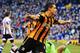 WEST BROMWICH, ENGLAND - DECEMBER 21: Jake Livermore of Hull City shoots celebrates scoring during the Barclays Premier League match between West Bromwich Albion and Hull City at The Hawthorns on December 21, 2013 in West Bromwich, England. (Photo by Richard Heathcote/Getty Images)