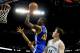 Nov 26, 2013; New Orleans, LA, USA; Golden State Warriors small forward Harrison Barnes (40) shoots over New Orleans Pelicans center Jason Smith (14) and power forward Anthony Davis during the second half of a game at New Orleans Arena. The Warriors defeated the Pelicans 102-101. Mandatory Credit: Derick E. Hingle-USA TODAY Sports