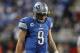 Dec 22, 2013; Detroit, MI, USA; Detroit Lions quarterback Matthew Stafford (9) looks down during overtime against the New York Giants at Ford Field. Giants beat the Lions 23-20. Mandatory Credit: Raj Mehta-USA TODAY Sports