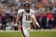 Dec 22, 2013; Houston, TX, USA; Denver Broncos quarterback Peyton Manning (18) smiles against the Houston Texans during the first half at Reliant Stadium. Mandatory Credit: Thomas Campbell-USA TODAY Sports