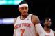 NEW YORK, NY - DECEMBER 16: Carmelo Anthony #7 of the New York Knicks looks on during the second half against the Washington Wizards at Madison Square Garden on December 16, 2013 in New York City. NOTE TO USER: User expressly acknowledges and agrees that, by downloading and/or using this photograph, user is consenting to the terms and conditions of the Getty Images License Agreement. The Wizards defeat the Knicks 102-101. (Photo by Maddie Meyer/Getty Images)