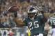 Dec 22, 2013; Philadelphia, PA, USA; Philadelphia Eagles running back LeSean McCoy (25) celebrates after scoring a touchdown during the first quarter at Lincoln Financial Field. Mandatory Credit: Tommy Gilligan-USA TODAY Sports