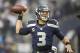 Dec 22, 2013; Seattle, WA, USA; Seattle Seahawks quarterback Russell Wilson (3) passes against the Arizona Cardinals during the fourth quarter at CenturyLink Field. Mandatory Credit: Joe Nicholson-USA TODAY Sports