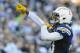 Dec 22, 2013; San Diego, CA, USA; San Diego Chargers receiver Keenan Allen (13) celebrates after a touchdown reception during the second half against the Oakland Raiders at Qualcomm Stadium. Mandatory Credit: Christopher Hanewinckel-USA TODAY Sports