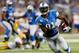 DETROIT, MI - NOVEMBER 28: Calvin Johnson #81 of the Detroit Lions runs for a third quarter touchdown while playing the Green Bay Packers at Ford Field on November 28, 2013 in Detroit, Michigan. (Photo by Gregory Shamus/Getty Images)