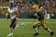 GREEN BAY, WI - NOVEMBER 04: Matt Forte #22 of the Chicago Bears is chased by Morgan Bennett #42 of the Green Bay Packers at Lambeau Field on November 4, 2013 in Green Bay, Wisconsin. The Bears defeated the Packers 27-20. (Photo by Jonathan Daniel/Getty Images)