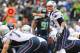 Oct 14, 2012; Seattle, WA, USA; New England Patriots quarterback Tom Brady (12) calls out a play at the line during the second half against the Seattle Seahawks at CenturyLink Field. Seattle defeated New England 24-23. Mandatory Credit: Steven Bisig-USA TODAY Sports