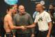 Dec 27, 2013; Las Vegas, NV, USA; UFC president Dana White looks on as Chris Weidman and Anderson Silva shake hands at the weigh-in for their UFC Middleweight Title Fight at MGM Grand Garden Arena. Mandatory Credit: Jayne Kamin-Oncea-USA TODAY Sports
