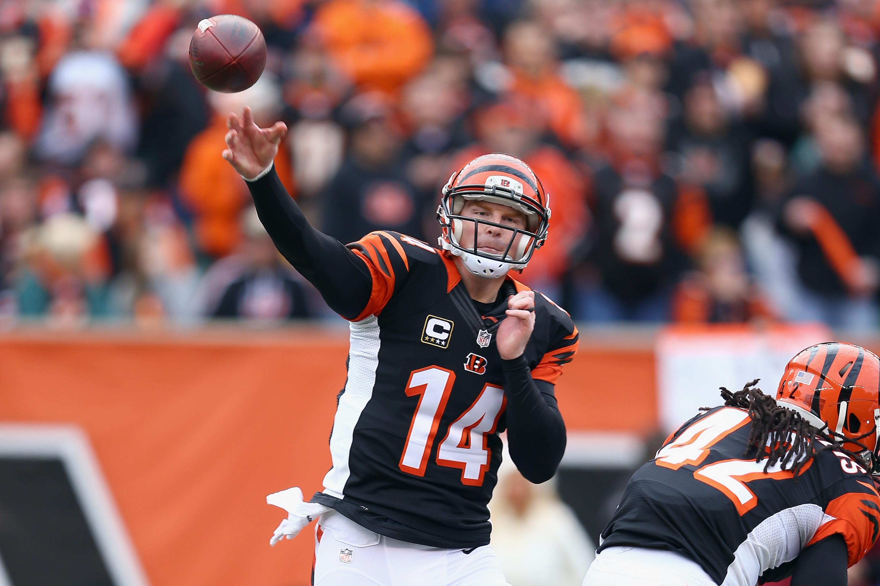 Cincinnati Bengals quarterback Andy Dalton (14) jogs off the field  following the come from behind 16-10 Bengals win against the Pittsburgh  Steelers at Heinz Field in Pittsburgh on November 1, 2015. Photo