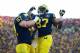 Nov 30, 2013; Ann Arbor, MI, USA; Michigan Wolverines tight end Devin Funchess (87) celebrates with offensive linesman Kyle Kalis (67) after catching a pass in the touchdown during the fourth quarter against the Ohio State Buckeyes at Michigan Stadium. Mandatory Credit: Andrew Weber-USA TODAY Sports
