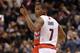 Dec 28, 2013; Toronto, Ontario, CAN; Toronto Raptors point guard Kyle Lowry (7) reacts after making a three-point shot against the New York Knicks at Air Canada Centre. The Raptors beat the Knicks 115-100. Mandatory Credit: Tom Szczerbowski-USA TODAY Sports