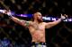 BOSTON, MA - AUGUST 17: Travis Browne celebrates after winning with a knockout against Alistair Overeem in their heavyweight bout at TD Garden on August 17, 2013 in Boston, Massachusetts. (Photo by Jared Wickerham/Getty Images)