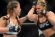Dec 28, 2013; Las Vegas, NV, USA; Ronda Rousey (red gloves) and Miesha Tate (blue gloves) fight during their UFC women's bantamweight championship bout at the MGM Grand Garden Arena. Mandatory Credit: Jayne Kamin-Oncea-USA TODAY Sports