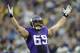 MINNEAPOLIS, MN - DECEMBER 29: Jared Allen #69 of the Minnesota Vikings celebrates a sack as Matthew Stafford #9 of the Detroit Lions looks on during the first quarter of the game on December 29, 2013 at Mall of America Field at the Hubert H. Humphrey Metrodome in Minneapolis, Minnesota. (Photo by Hannah Foslien/Getty Images)