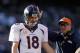 OAKLAND, CA - DECEMBER 29: Peyton Manning #18 of the Denver Broncos is congratulated by head coach John Fox after Manning threw Demaryius Thomas #88 a five-yard touchdown pass that broke the single season passing yard record during their game against the Oakland Raiders at O.co Coliseum on December 29, 2013 in Oakland, California. (Photo by Ezra Shaw/Getty Images)