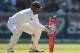 MELBOURNE, AUSTRALIA - DECEMBER 26: Kumar Sangakkara of Sri Lanka runs out Phillip Hughes of Australia during day one of the Second Test match between Australia and Sri Lanka at Melbourne Cricket Ground on December 26, 2012 in Melbourne, Australia. (Photo by Scott Barbour/Getty Images)