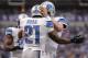 MINNEAPOLIS, MN - DECEMBER 29: Reggie Bush #21 and Matthew Stafford #9 of the Detroit Lions celebrate a touchdown against the Minnesota Vikings during the third quarter of the game on December 29, 2013 at Mall of America Field at the Hubert H. Humphrey Metrodome in Minneapolis, Minnesota. The Vikings defeated the Lions 14-13. (Photo by Hannah Foslien/Getty Images)