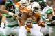 Malcolm Brown has carried the Longhorns through the first half of the Alamo Bowl.