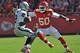 KANSAS CITY, MO - OCTOBER 13: Linebacker Justin Houston #50 of the Kansas City Chiefs closes in on quarterback Terrelle Pryor #2 of the Oakland Raiders during the first half on October 13, 2013 at Arrowhead Stadium in Kansas City, Missouri. (Photo by Peter Aiken/Getty Images)