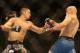 Sep 21, 2013; Toronto, Ontario, CAN; Dustin Kimura (left) fights Mitch Gagnon during their Bantamweight bout at UFC 165 at the Air Canada Centre. Mandatory Credit: Tom Szczerbowski-USA TODAY Sports