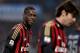 MILAN, ITALY - DECEMBER 22: Mario Balotelli (L) of AC Milan smiles during the Serie A match between FC Internazionale Milano and AC Milan at San Siro Stadium on December 22, 2013 in Milan, Italy. (Photo by Claudio Villa/Getty Images)
