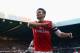 NEWCASTLE UPON TYNE, ENGLAND - DECEMBER 29: Olivier Giroud of Arsenal celebrates scoring the opening goal during the Barclays Premier League match between Newcastle United and Arsenal at St James' Park on December 29, 2013 in Newcastle upon Tyne, England. (Photo by Michael Regan/Getty Images)